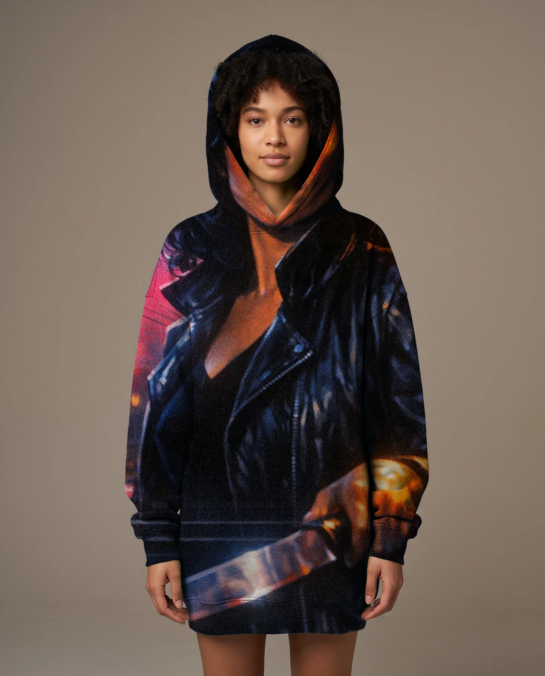 A woman in a hoodie printed edge to edge with the VHS Slasher render of Mara, hood up
